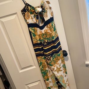 Jumpsuit -green shell print tie front